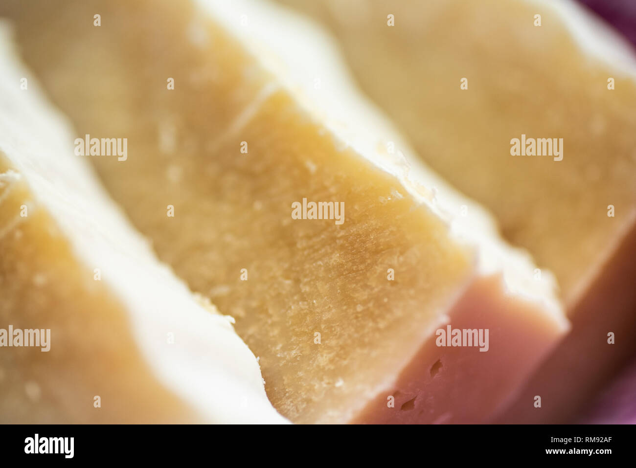 Several bars of handcrafted soap at an angle. Stock Photo