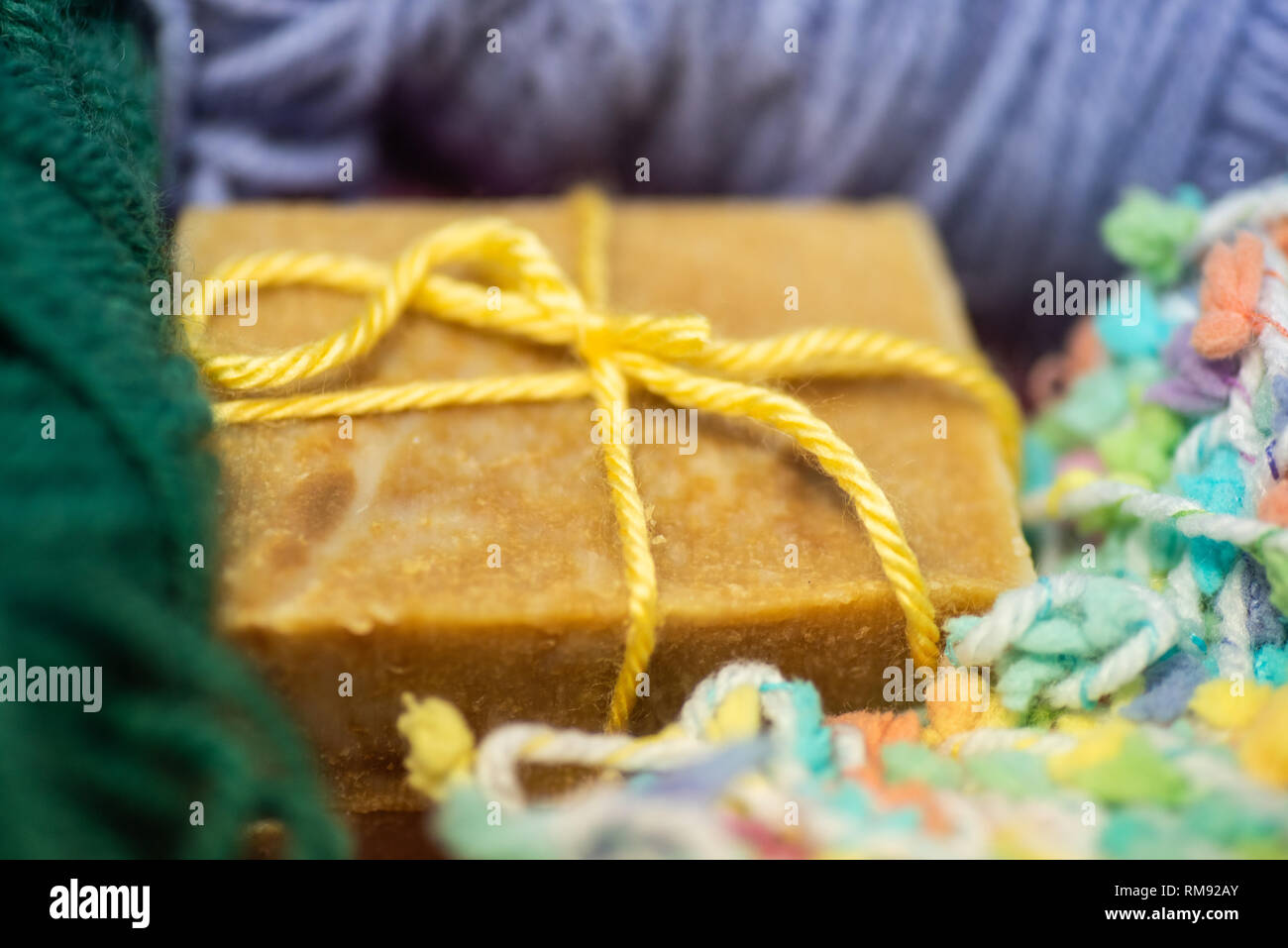 Bars of handcrafted soap with yarn. Stock Photo