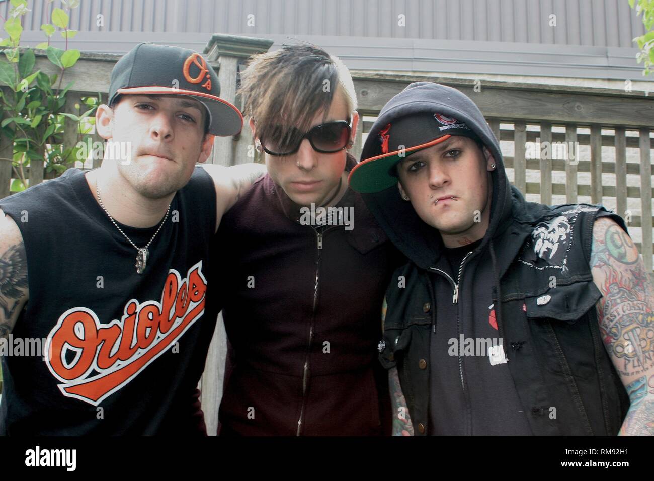 Good Charlotte band members are shown posing for a photo before their 'live' concert performance. Stock Photo