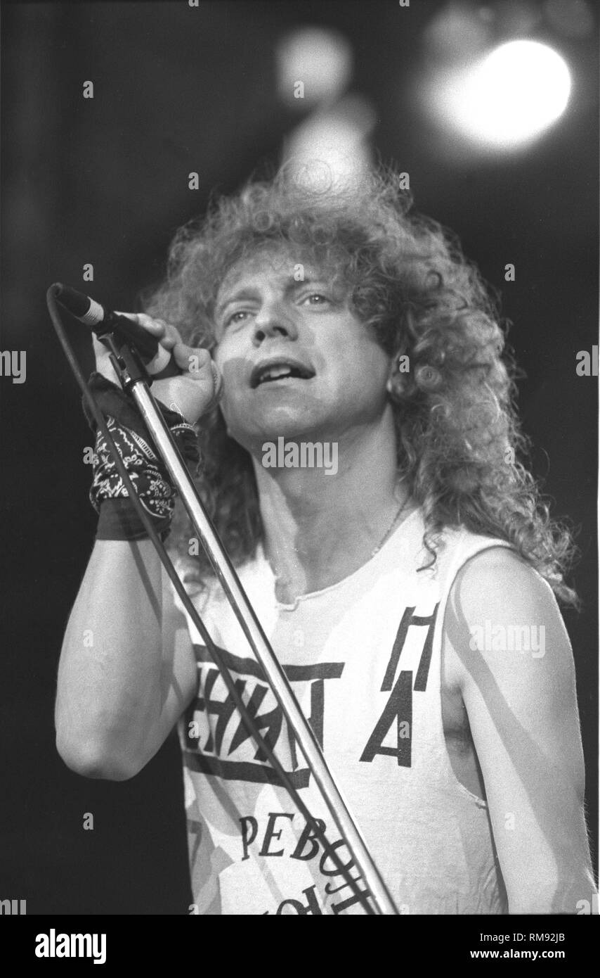 Singer Lou Gramm, best known for his role as the lead vocalist for the rock band Foreigner, is shown performing on stage during a 'live' concert appearance with his solo band. Stock Photo