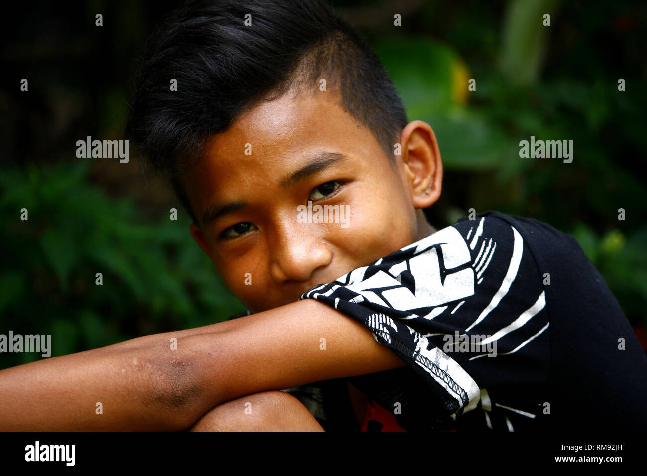 ANTIPOLO CITY, PHILIPPINES - JANUARY 25, 2019: Young Asian boy pose and ...