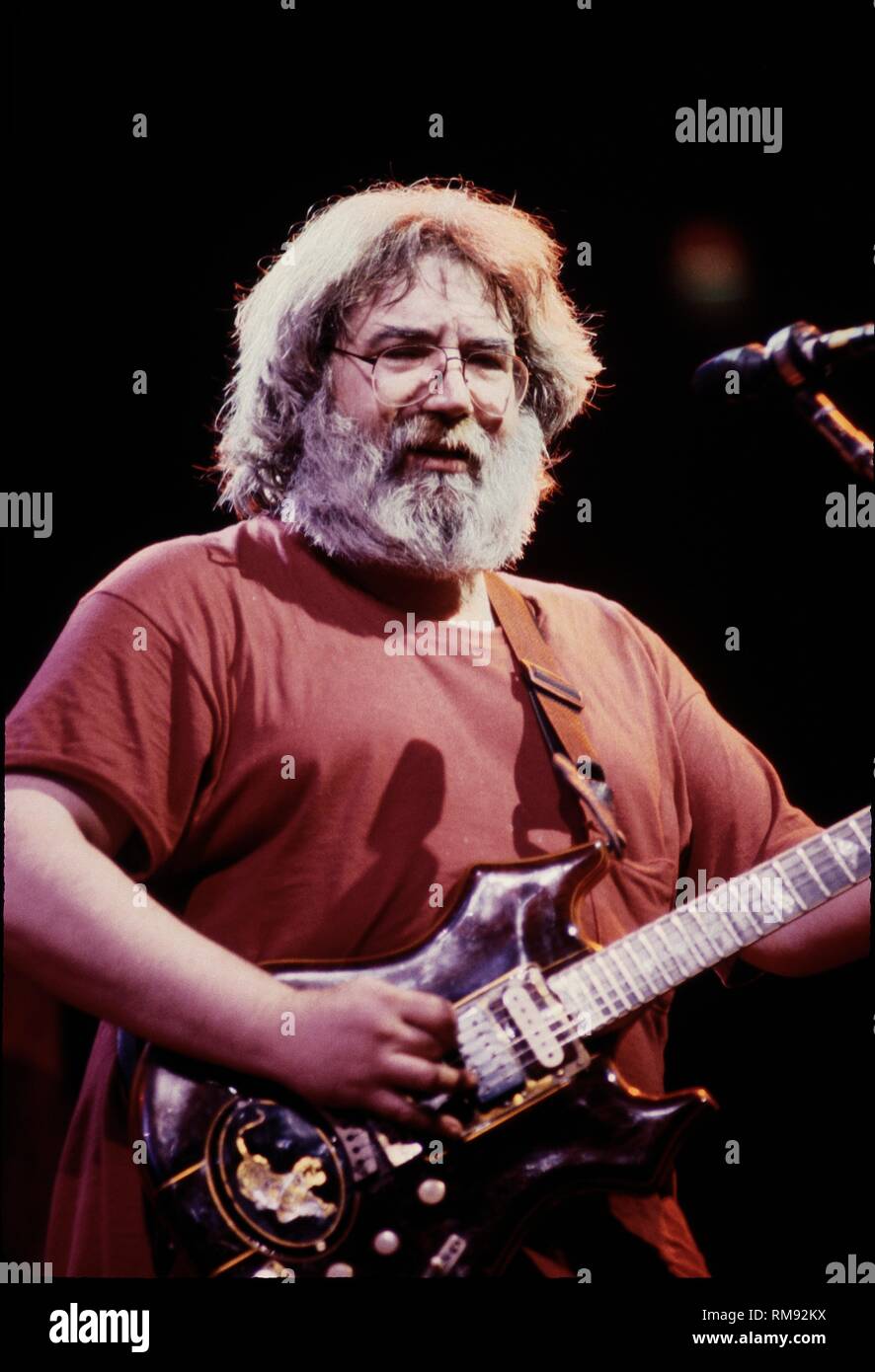 Singer, songwriter and guitarist Jerry Garcia of the Grateful Dead is shown performing on stage during a 'live' concert appearance. Stock Photo