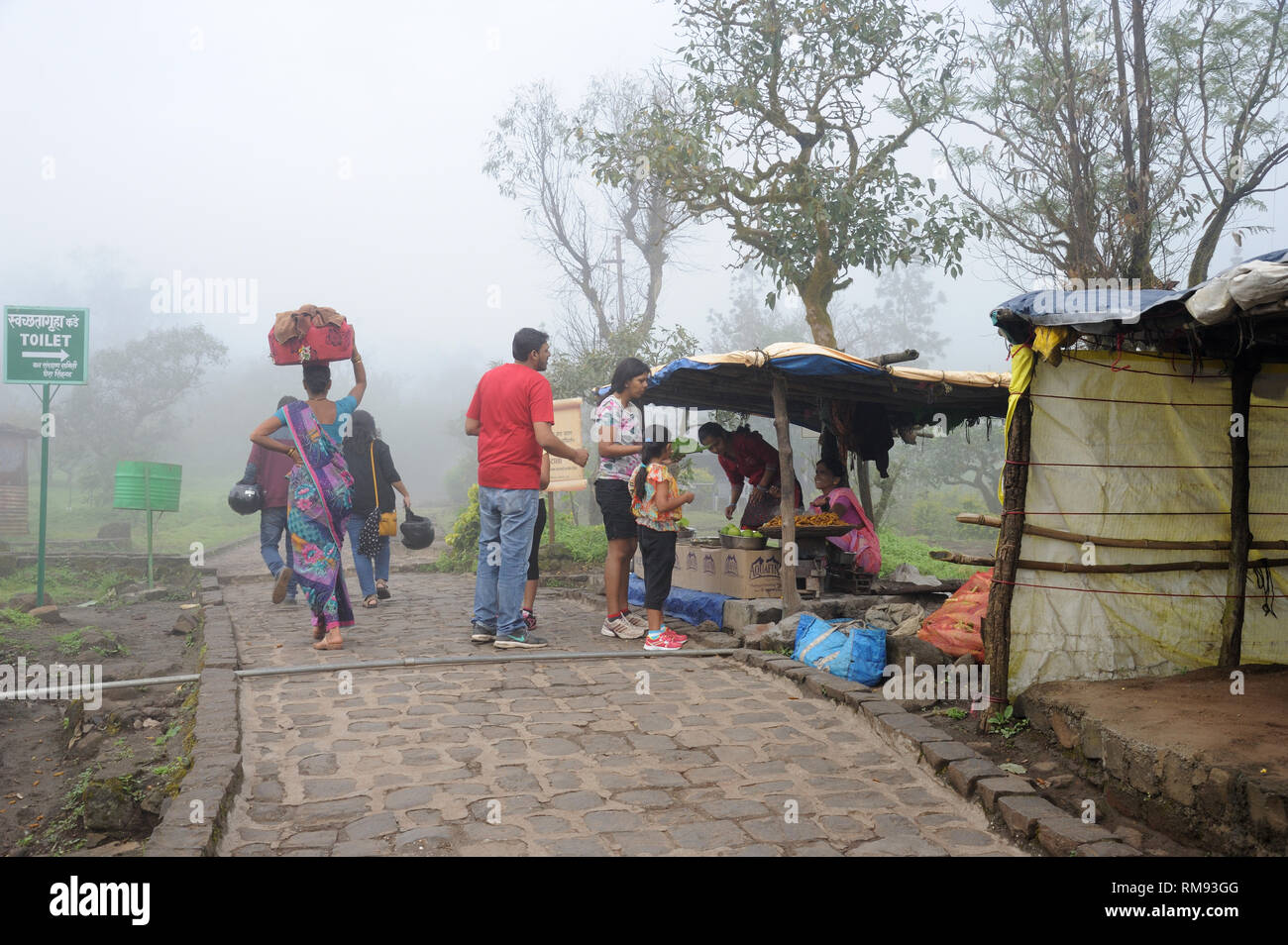 Family buying snacks, Sinhagad Fort, Pune, Maharashtra, India, Asia, MR#364 Stock Photo