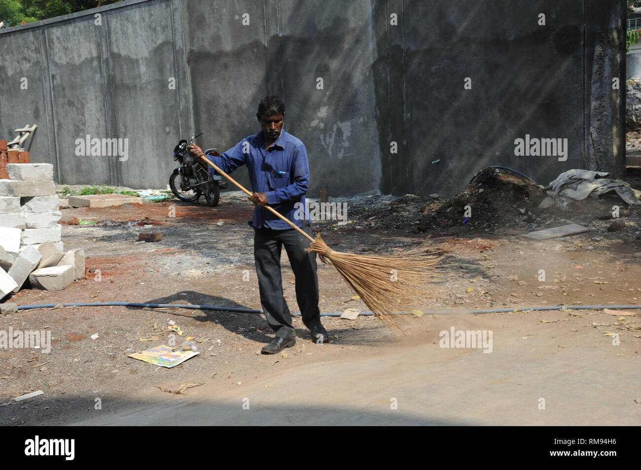 Street sweeper male hi-res stock photography and images - Alamy