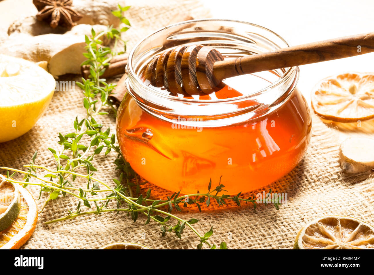 Honey with thyme and ginger Stock Photo Alamy