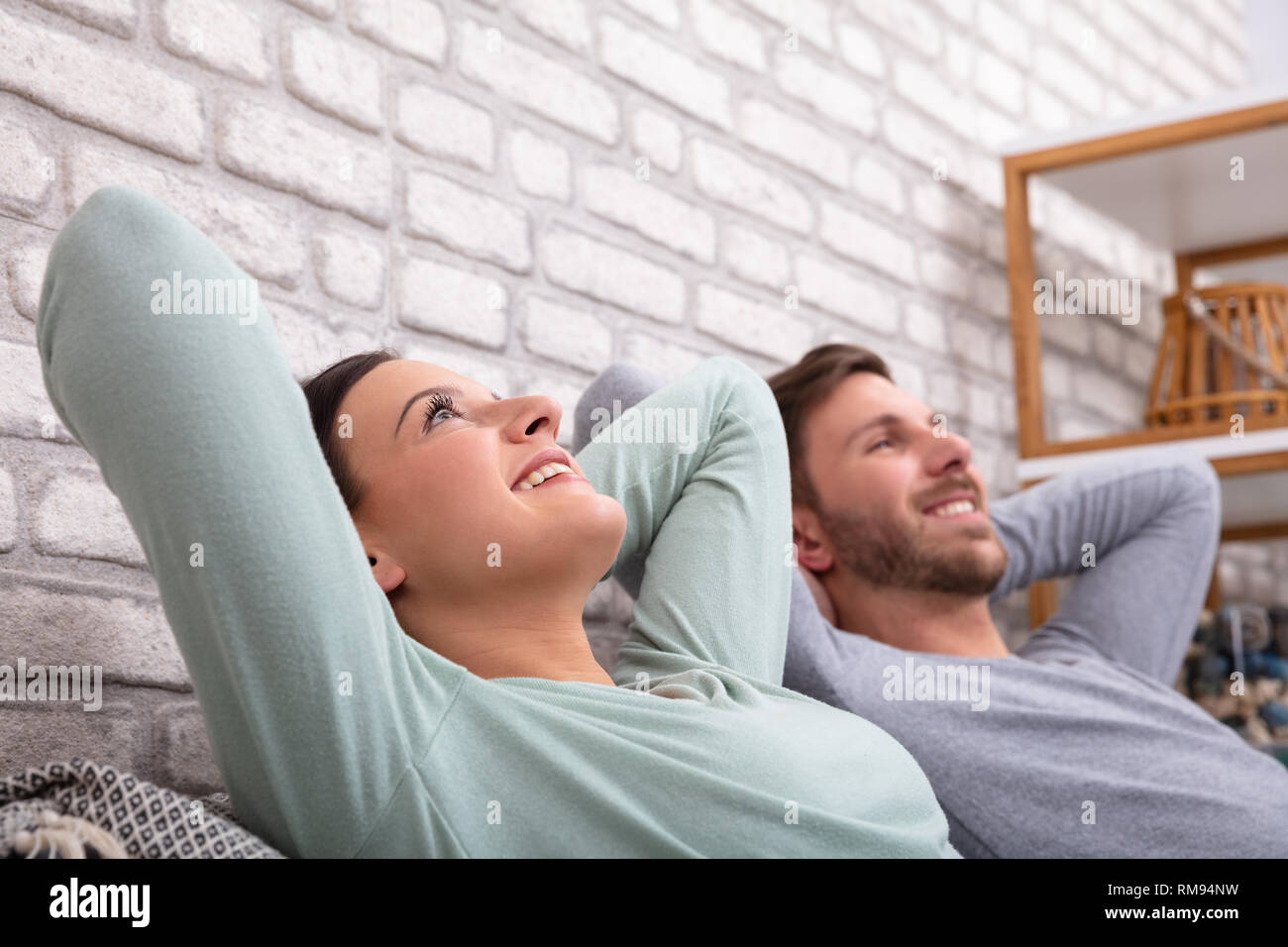Two young people relaxing home hi-res stock photography and images - Alamy