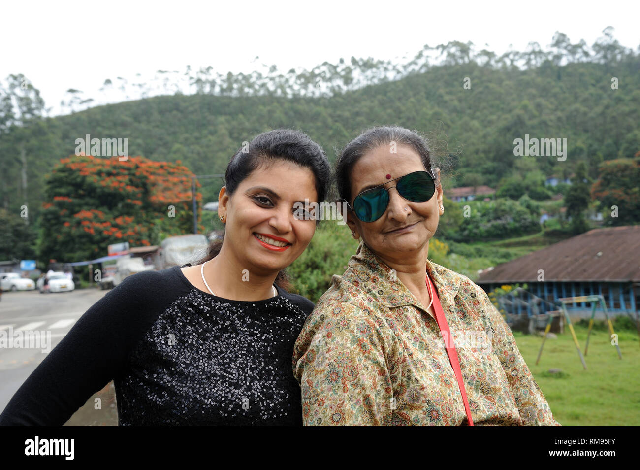 daughters with mother, Munnar, Kerala, India, Asia, MR#802B, MR#364 Stock Photo