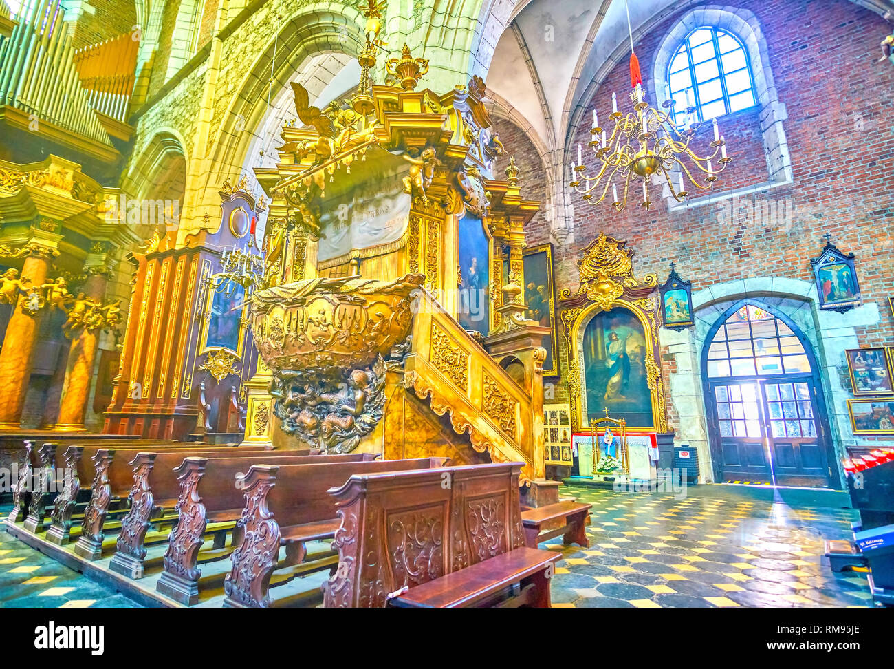 KRAKOW, POLAND - JUNE 21, 2018: The unusual boat-shaped wooden carved pulpit of Corpus Christi Basilica, on June 21 in Krakow Stock Photo