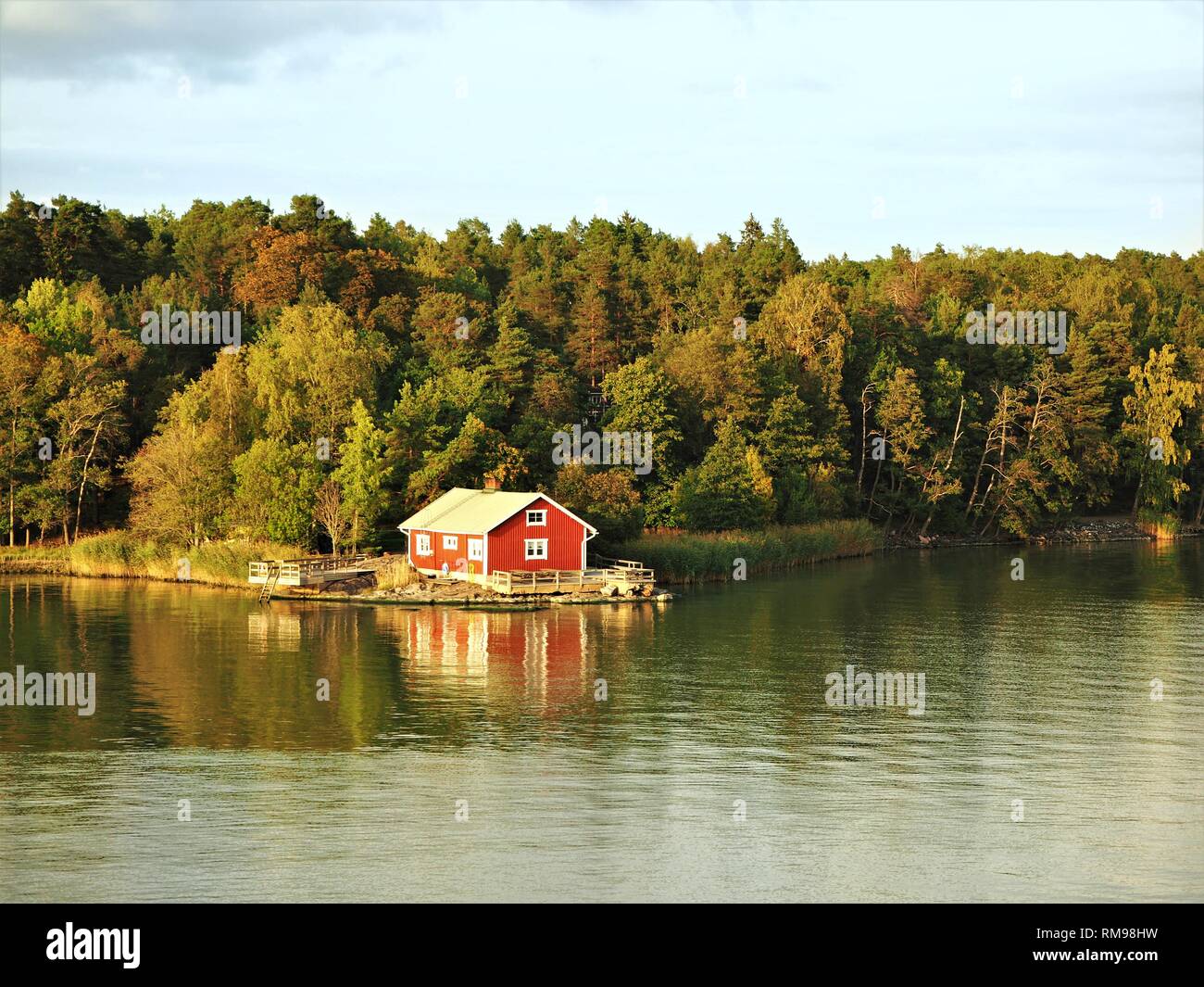 Cabin on the coast of a wooded island in the Turku Archipelago, Finland, in autumn Stock Photo