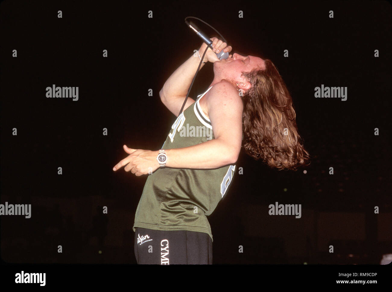 Candlebox vocalist Kevin Martin is shown on stage during a 'live' concert performance. Stock Photo