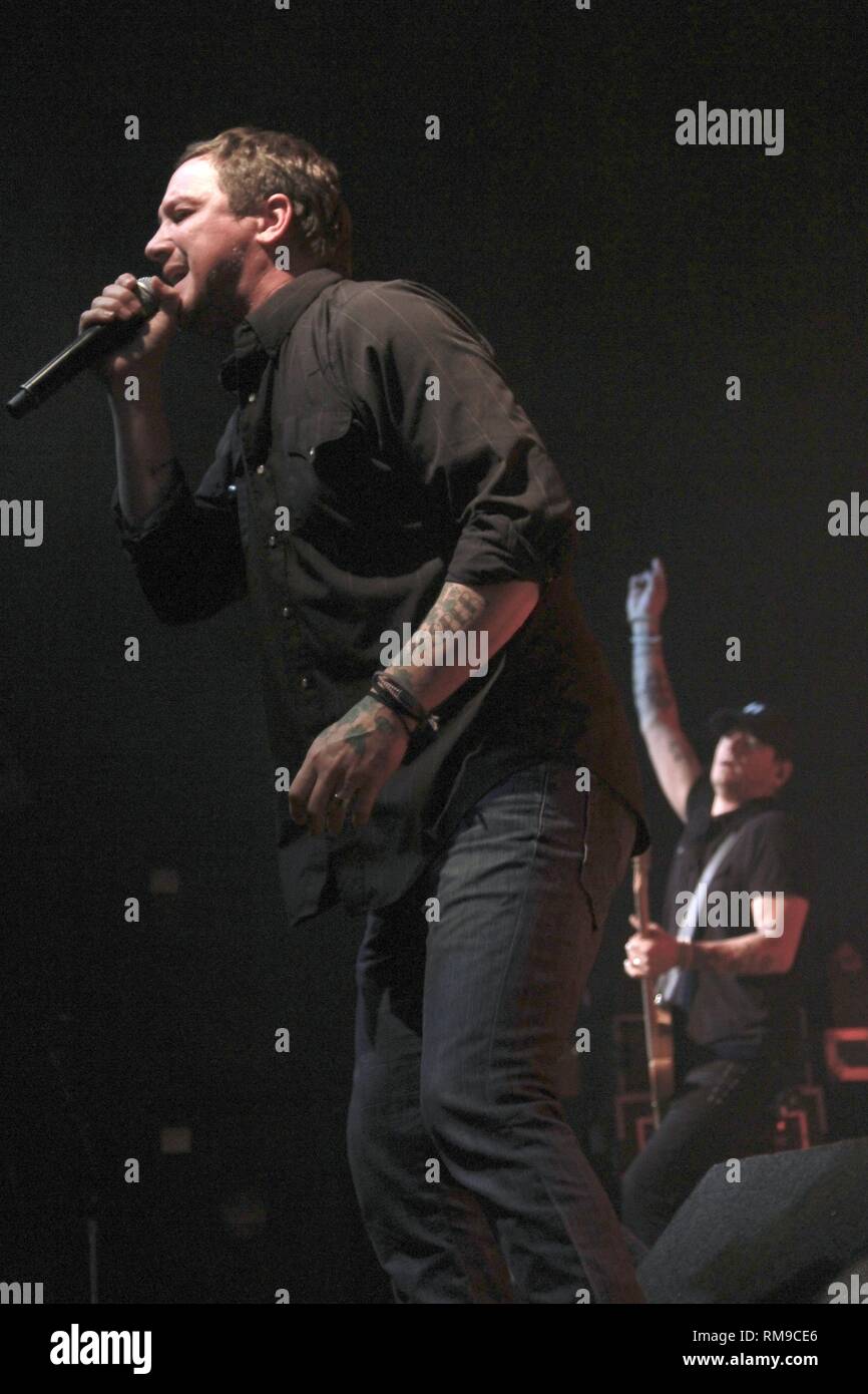 Singer Kevin Martin is shown performing on stage during a 'live' concert appearance with Candlebox. Stock Photo
