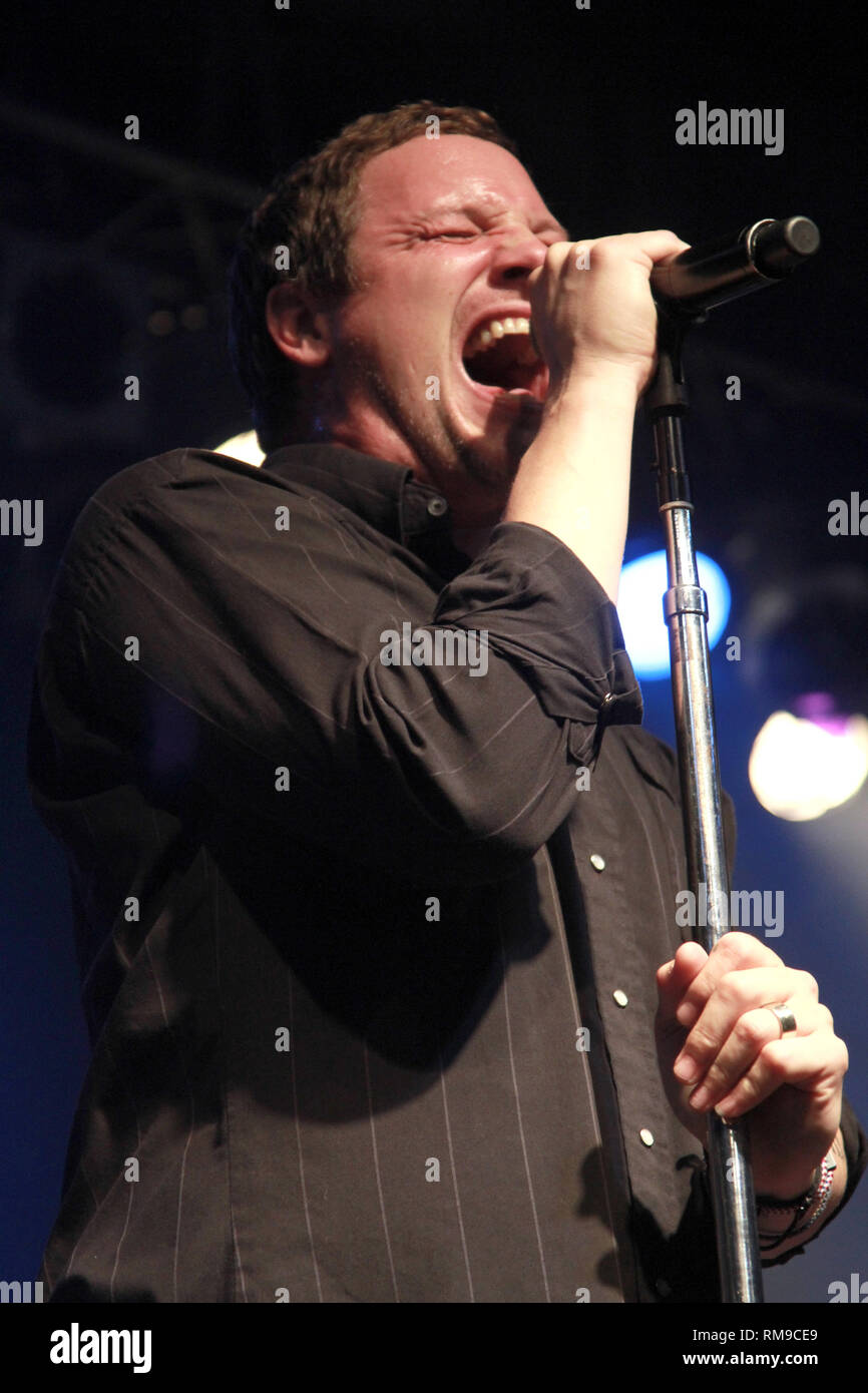 Singer Kevin Martin is shown performing on stage during a 'live' concert appearance with Candlebox. Stock Photo