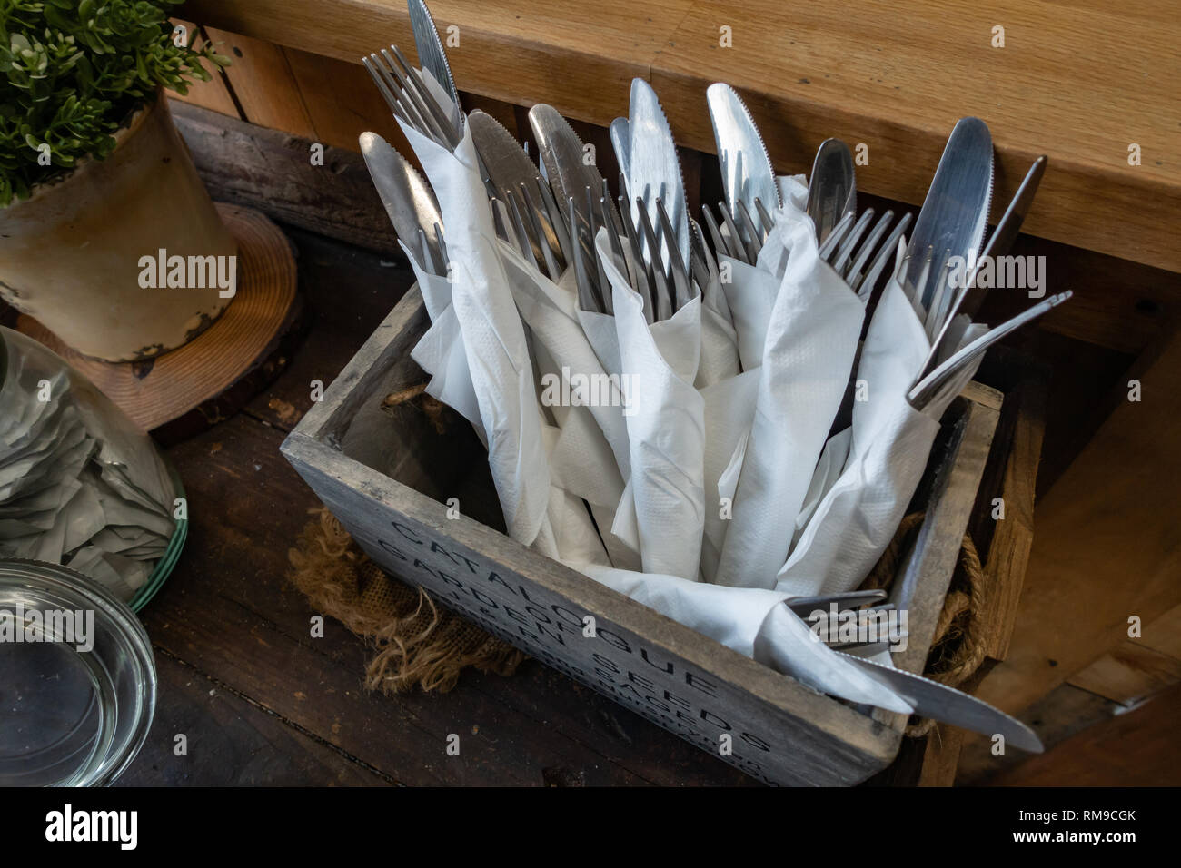 Sets of Cutlery wrapped in paper napkins in a Cafe in Rotherham, South