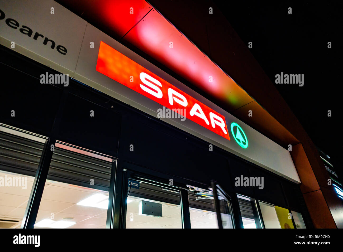 Night photograph of local late night open store SPAR shop front,award winning food & drink and convenient in-store in Wath, Rotherham, South Yorkshire Stock Photo