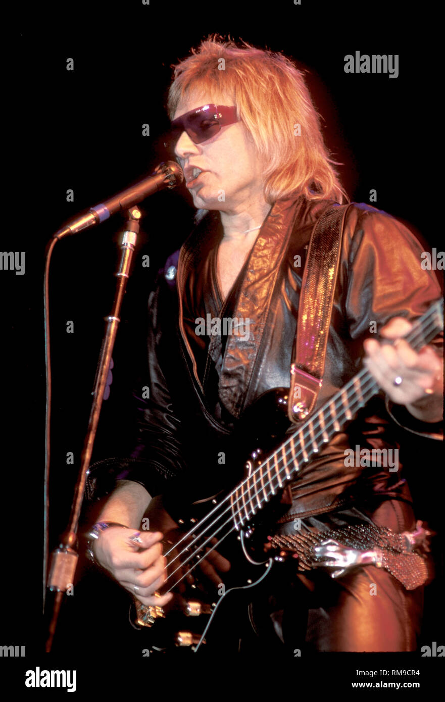 The Cars, bassist Benjamin Orr, is shown performing during a "live" concert appearance Stock