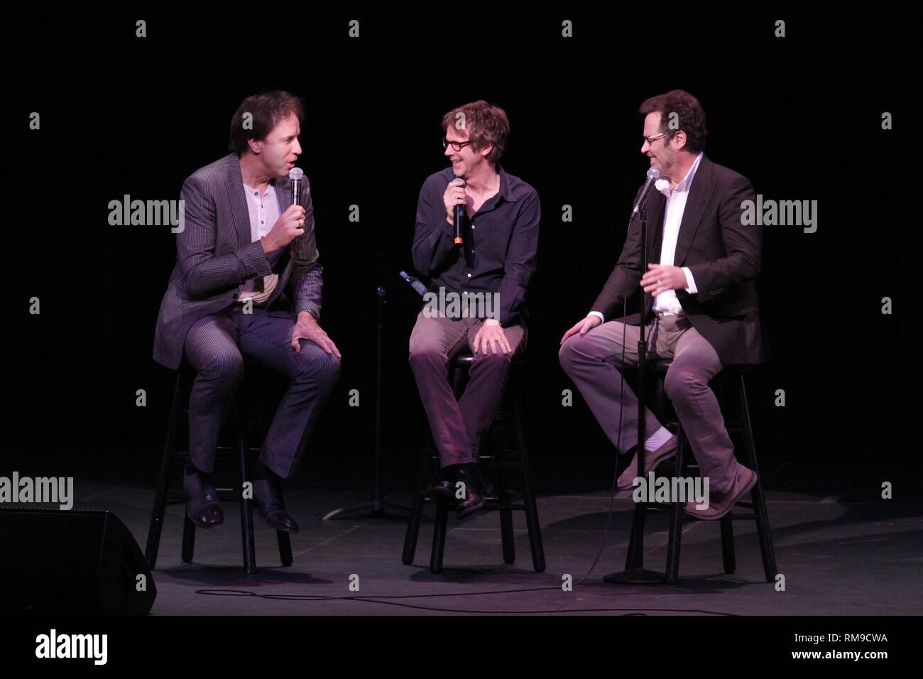 Comedians Kevin Nealon, Dana Carvey and Dennis Miller are shown during a 'Question and Answer' segment that follwoed their 'live' concert performances. Stock Photo