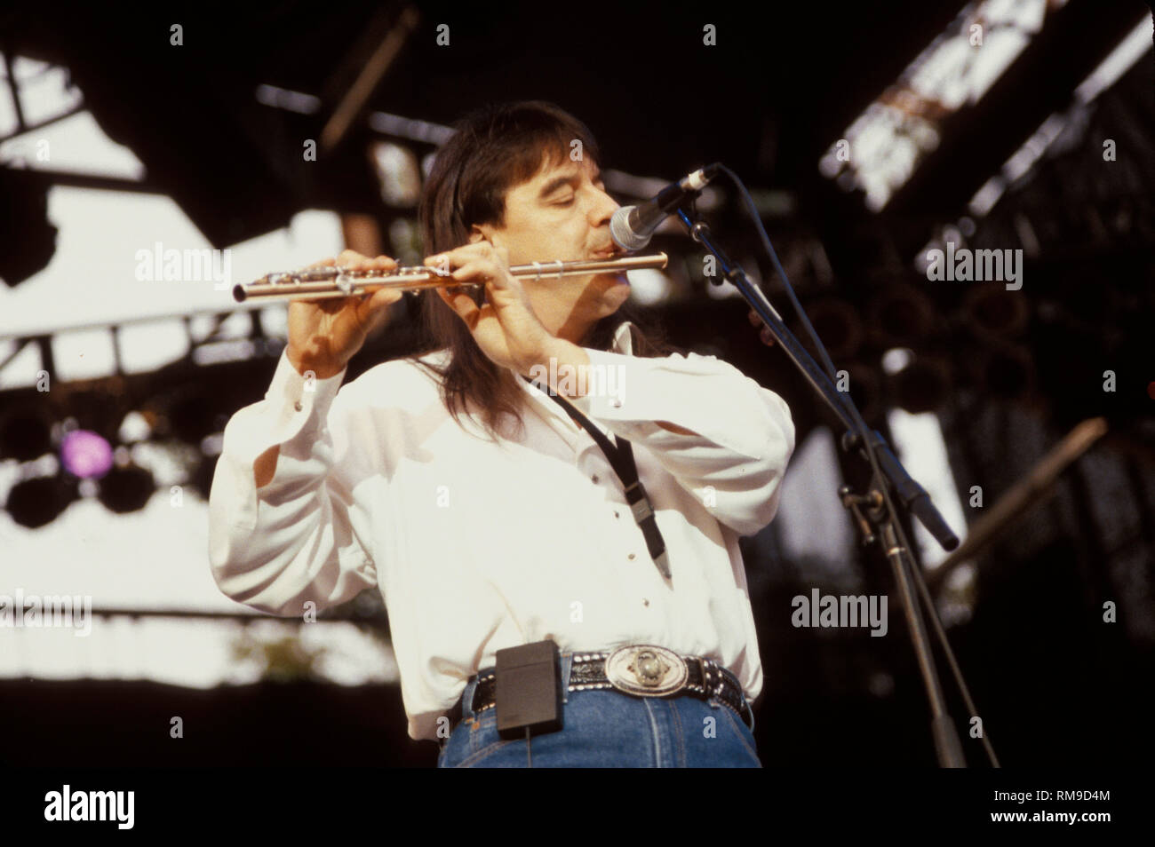 Chicago band members are shown performing on stage during a 'live' concert performance. Stock Photo