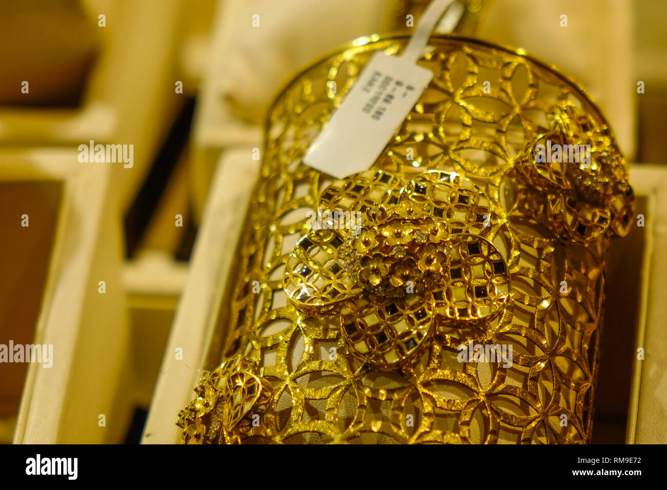 Dubai, UAE Dec 6, 2018. Gold jewelry in the display window of a