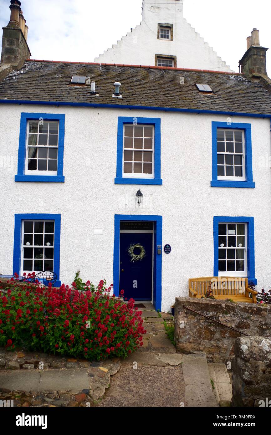 Quaint Blue and White Fishermans Cottage at Crail Harbour. East Fife