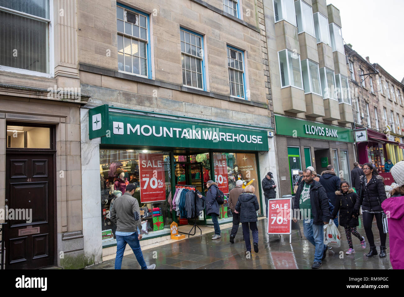 Mountain warehouse outdoor clothing store and branch of Lloyds bank in Lancaster city centre,Lancashire,England Stock Photo
