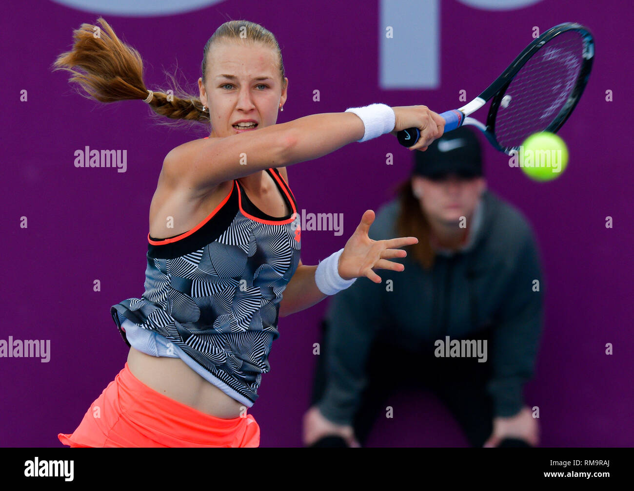Doha, Qatar. 13th Feb, 2019. Anna Blinkova of Russia hits a return during  the women's singles second round match between Anna Blinkova of Russia and  Barbora Strycova of Czech Republic at the