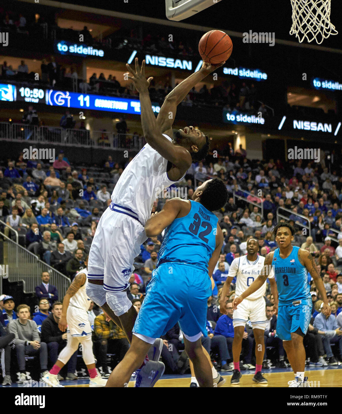 Newark, New Jersey, USA. 13th Feb, 2019. Seton Hall Pirates forward Michael Nzei (1) shoots an
