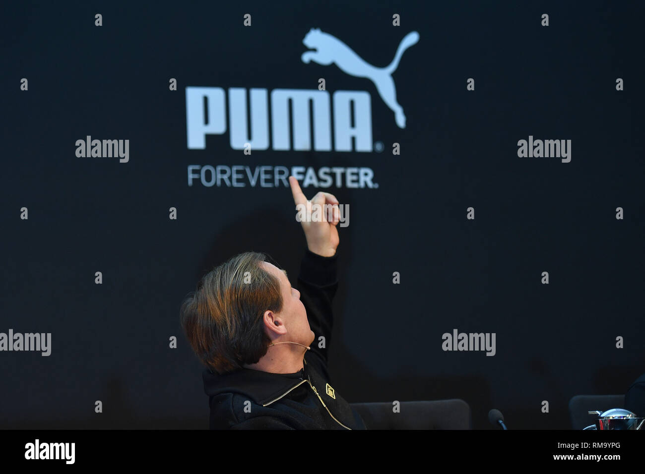 Herzogenaurach, Deutschland. 14th Feb, 2019. Bjoern GULDEN (CEO, Management  Chairman), gesture, points to the Puma brand emblem- front Puma logo, brand  emblem, single image, trimmed single motif, portrait, portrait, portrait .  PUMA