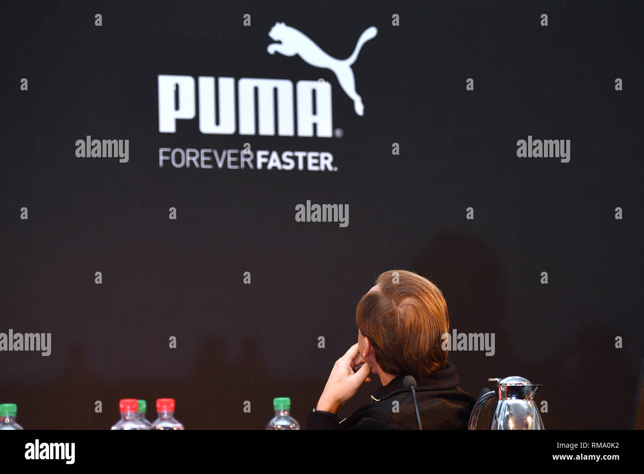 Bjoern GULDEN (CEO, Management Chairman), turns away and looks pensively at  the Puma brand emblem, logo, PUMA balance sheet press conference on  14.02.2020 in Herzogenaurach. Sporting goods manufacturer, lifestyle brand,  brand.
