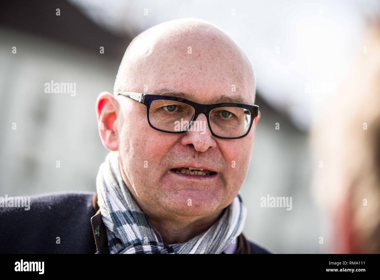 Munich, Bavaria, Germany. 14th Feb, 2019. HEINRICH BIRNER of the Verdi union in Munich. To signify the failure of the second round of talks with employers, the German Verdi Ver.di labor union organized a 200  strong flashmob action at the famed Schloss Nymphenburg in Munich to kick off a new strike wave. Credit: ZUMA Press, Inc./Alamy Live News Stock Photo