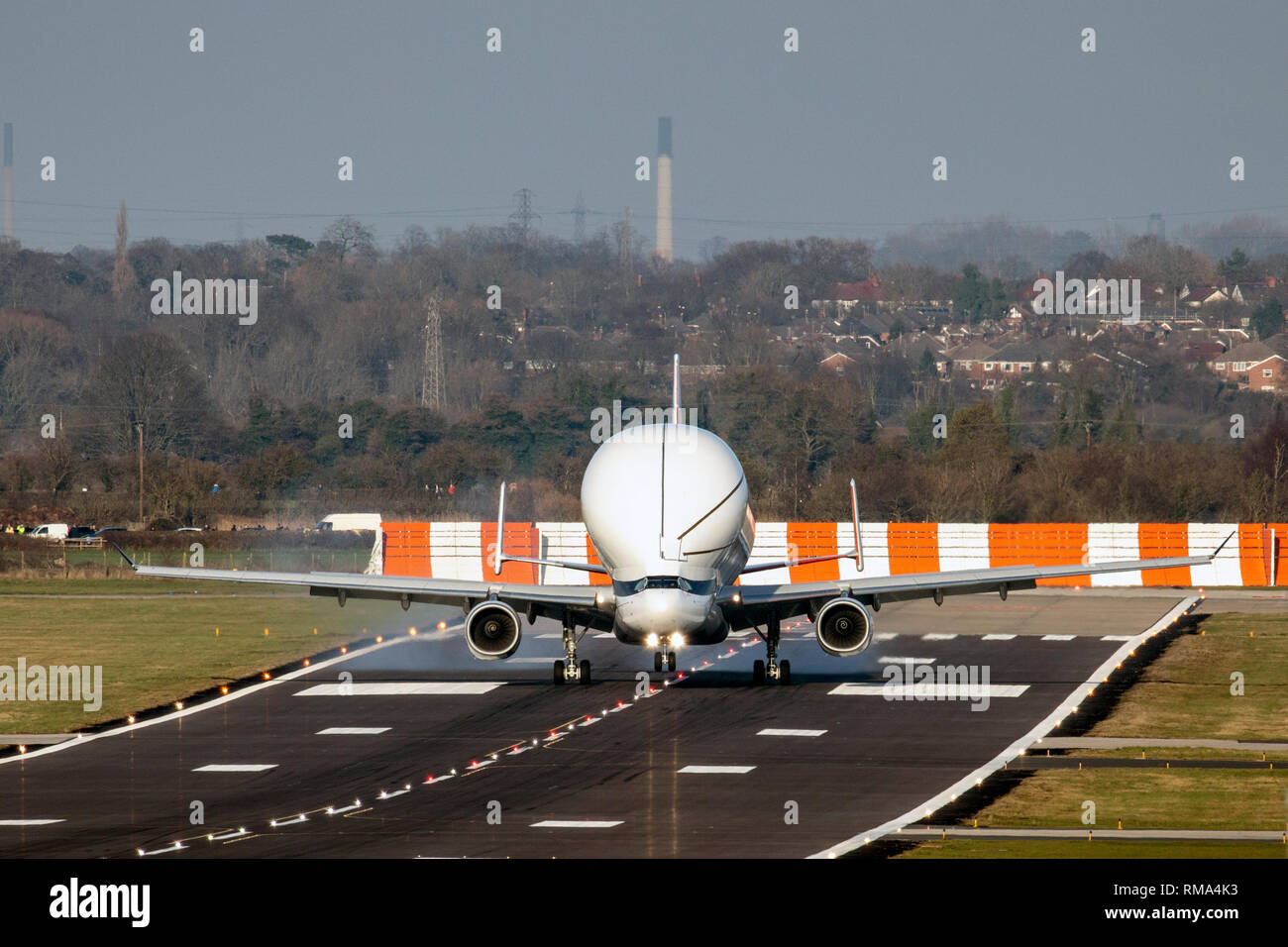 Hawarden Airport, Hawarden Flintshire, Wales, UK 14th February 2019.  Perfect weather for the first ever landing of the Airbus Beluga XL transporter plane that took off from Toulouse Airport and arrived at the Hawarden Airport for testing and ground crew exercises. Excitement has grown in the area and with plane enthusiasts as the plane known as the ‘flying whale’ arrived Stock Photo