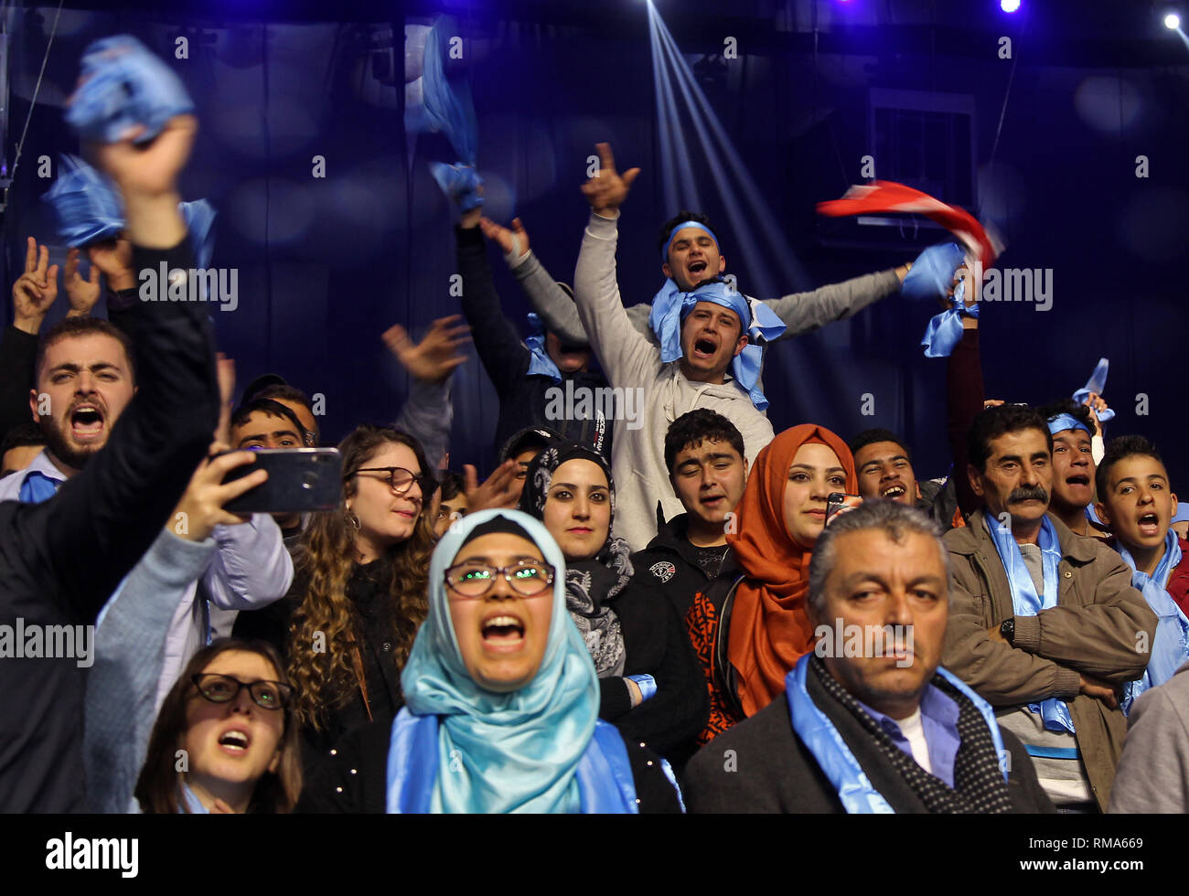 Beirut, Lebanon. 14th Feb, 2019. Supporters of Lebanese Prime Minister Saad Hariri cheer during a rally to mark the 14th anniversary of the assassination of former Prime Minister Rafic Hariri. Credit: Marwan Naamani/dpa/Alamy Live News Stock Photo