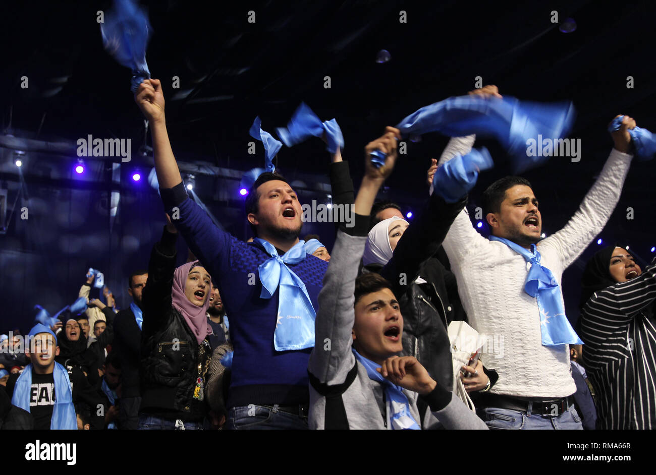 Beirut, Lebanon. 14th Feb, 2019. Supporters of Lebanese Prime Minister Saad Hariri cheer during a rally to mark the 14th anniversary of the assassination of former Prime Minister Rafic Hariri. Credit: Marwan Naamani/dpa/Alamy Live News Stock Photo