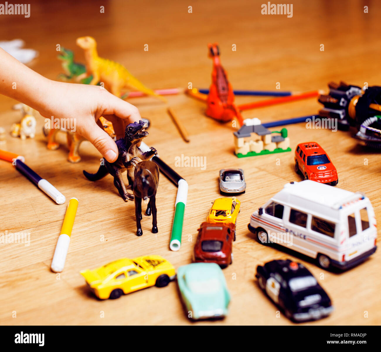 children playing toys on floor at home, little hand in mess, free ...