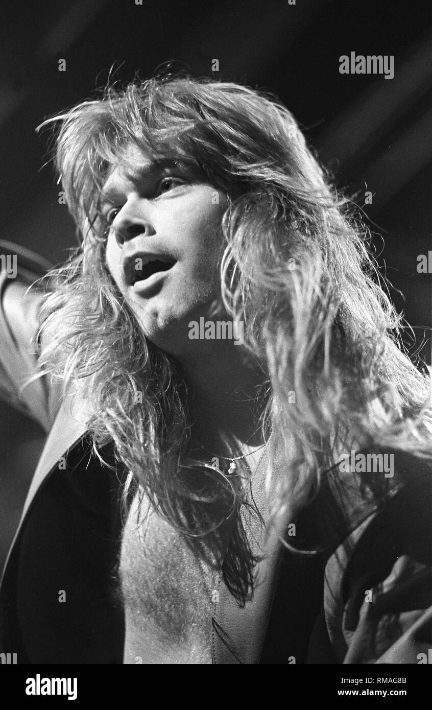 Singer Michael Kiske of the German heavy metal band Helloween is shown performing on stage during a 'live' concert appearance. Stock Photo