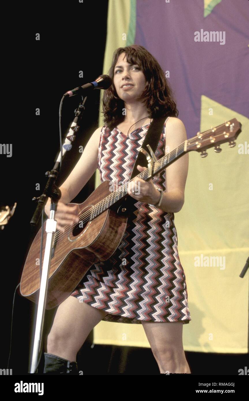 Vocalist, guitarist and actress Susanna Hoffs, best known as a member of the all female pop band The Bangles, is shown on stage performing with her solo band. Stock Photo