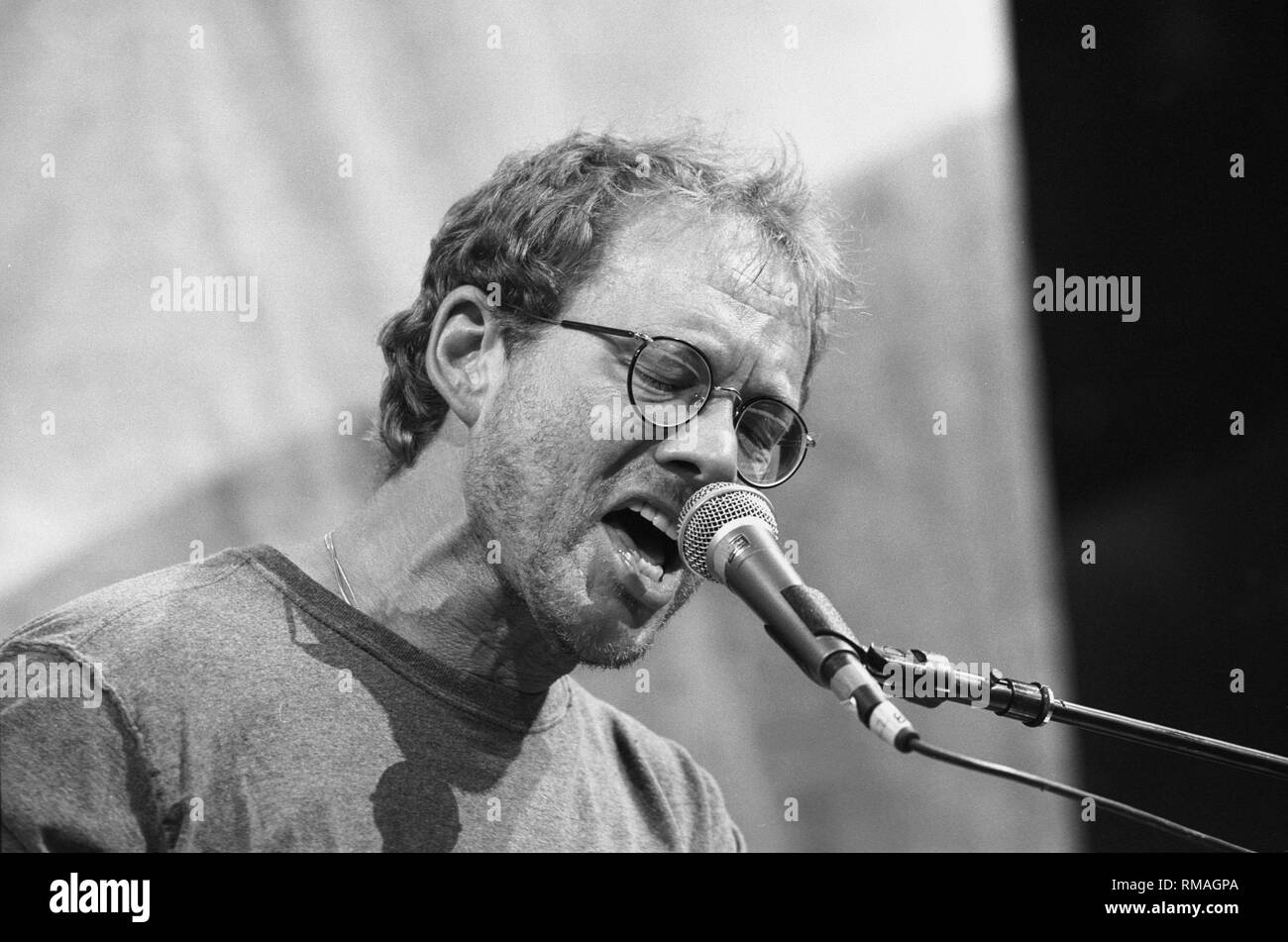 Singer, songwriter and guitarist Warren Zevon is shown performing on