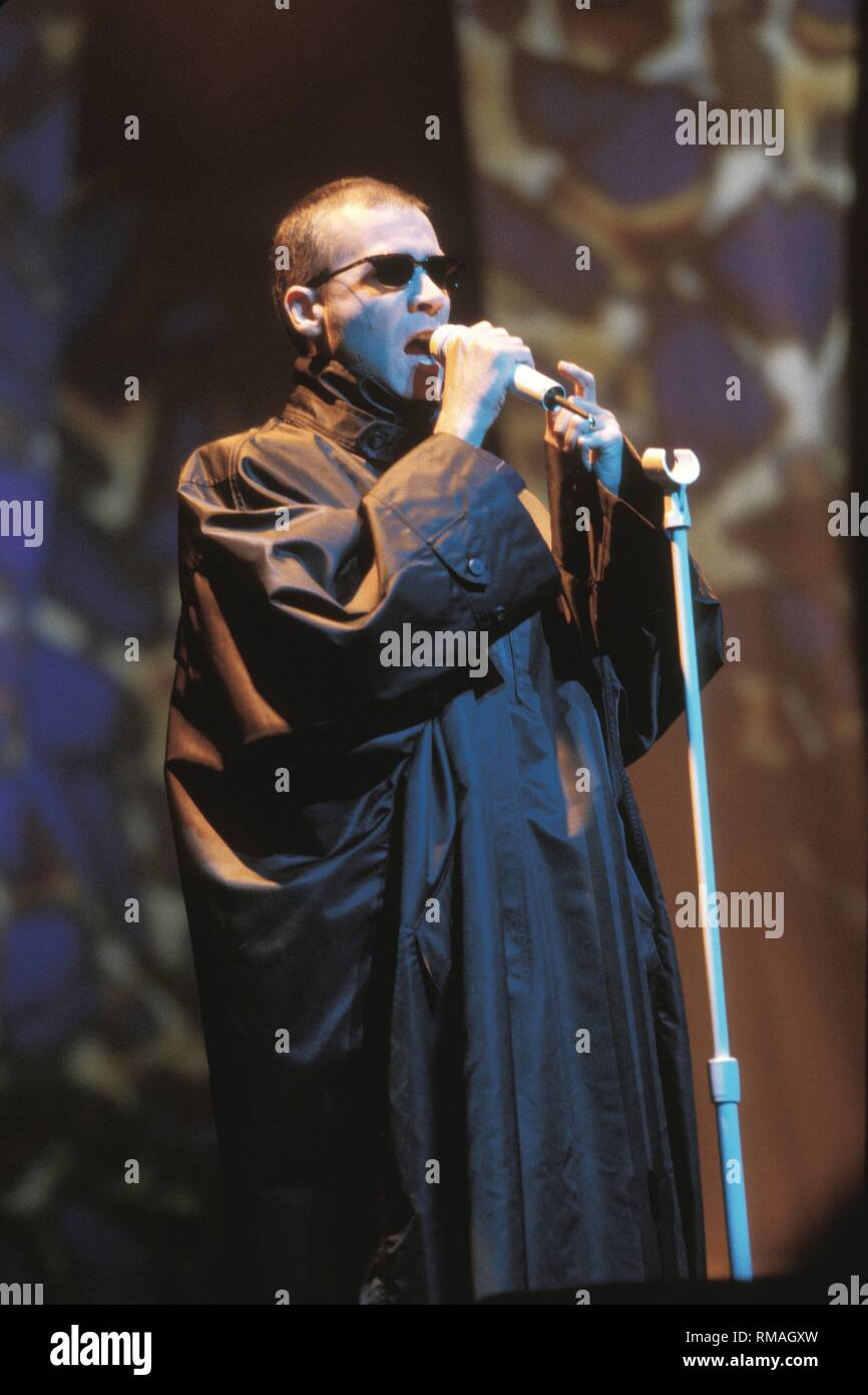 Singer Philip Oakey of The Human League is shown performing on stage during a concert appearance. Stock Photo