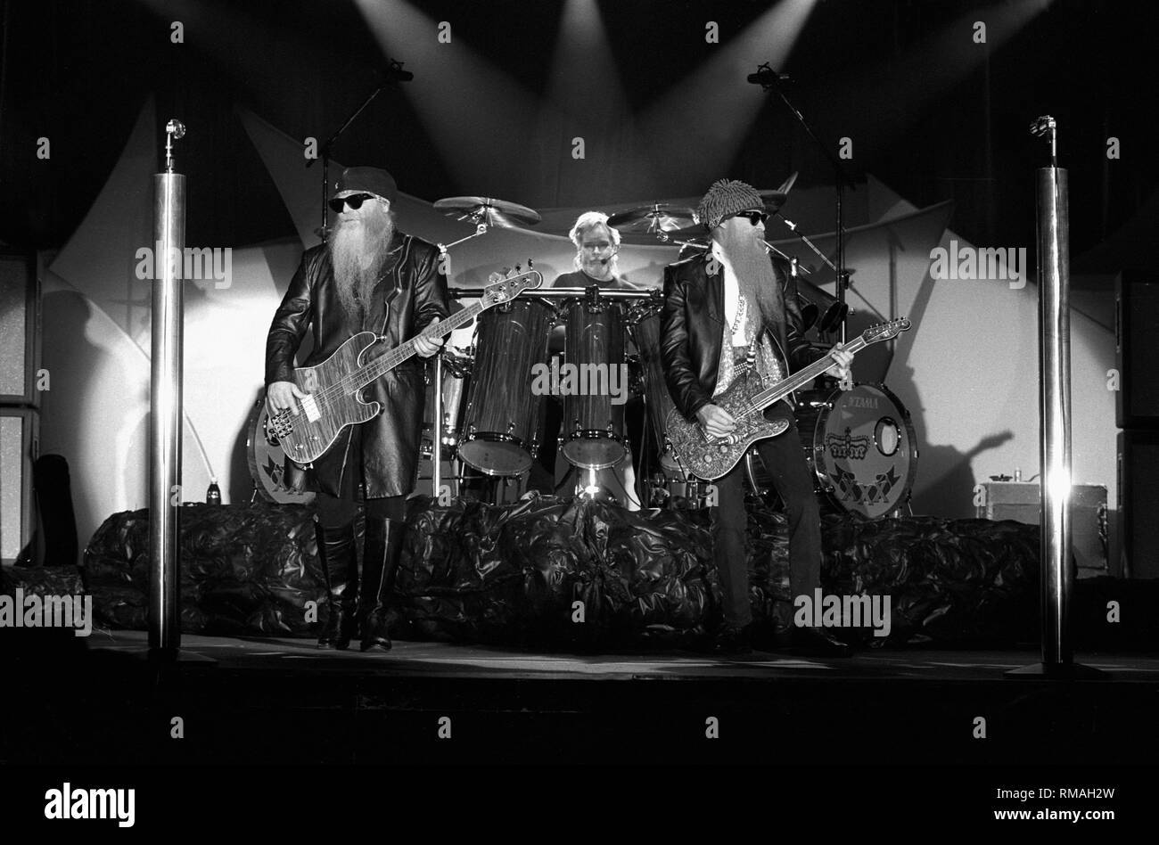 ZZ Top are shown performing on stage during a "live" appearance Stock