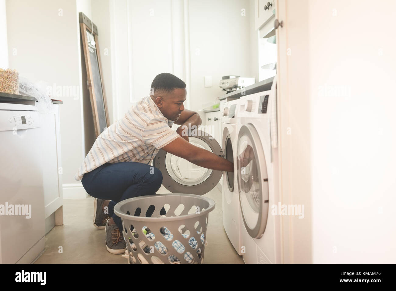 Washing Machine Laundry Basket Stock Photos & Washing Machine Laundry