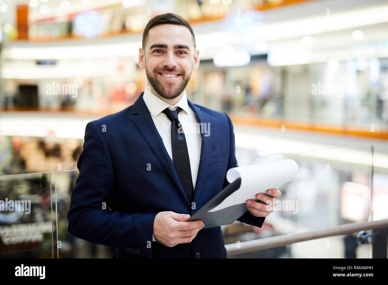 Agent with contract Stock Photo - Alamy