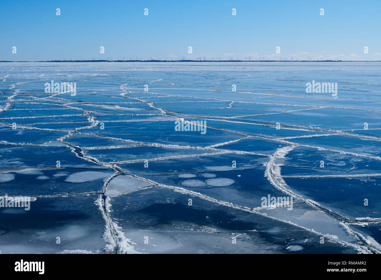 Lake Ontario covered by frozen ice in winter, Amherst Island, Ontario