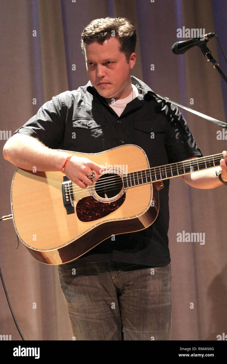 Singer, songwriter, and guitarist Jason Isbell is shown performing on