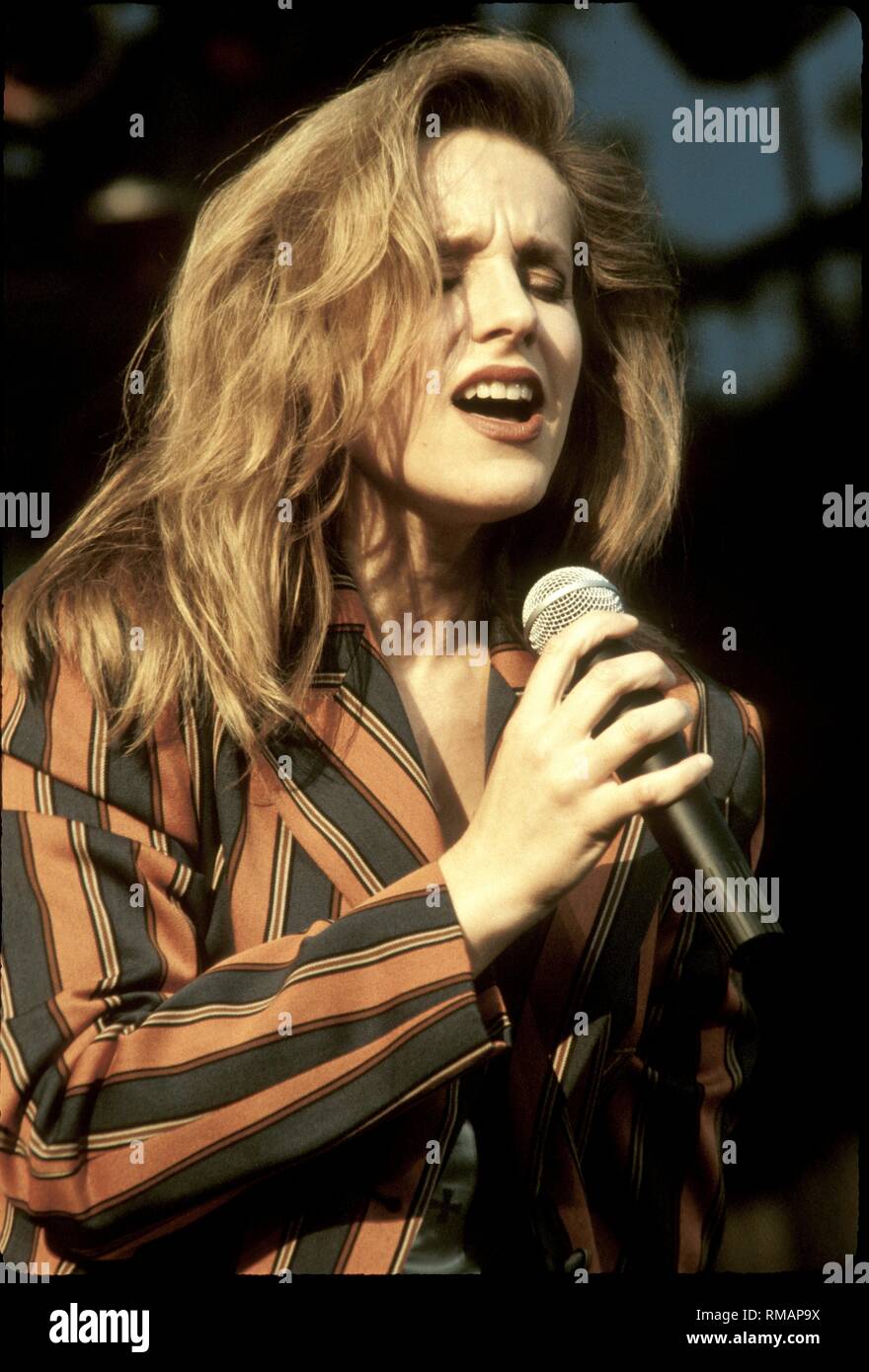 Pop and R&B singer Tara Kemp, best known for releasing two Top 10 singles, 'Hold You Tight' and 'Piece of My Heart,'  i shown performing on stage during a 'live' concert appearance. Stock Photo