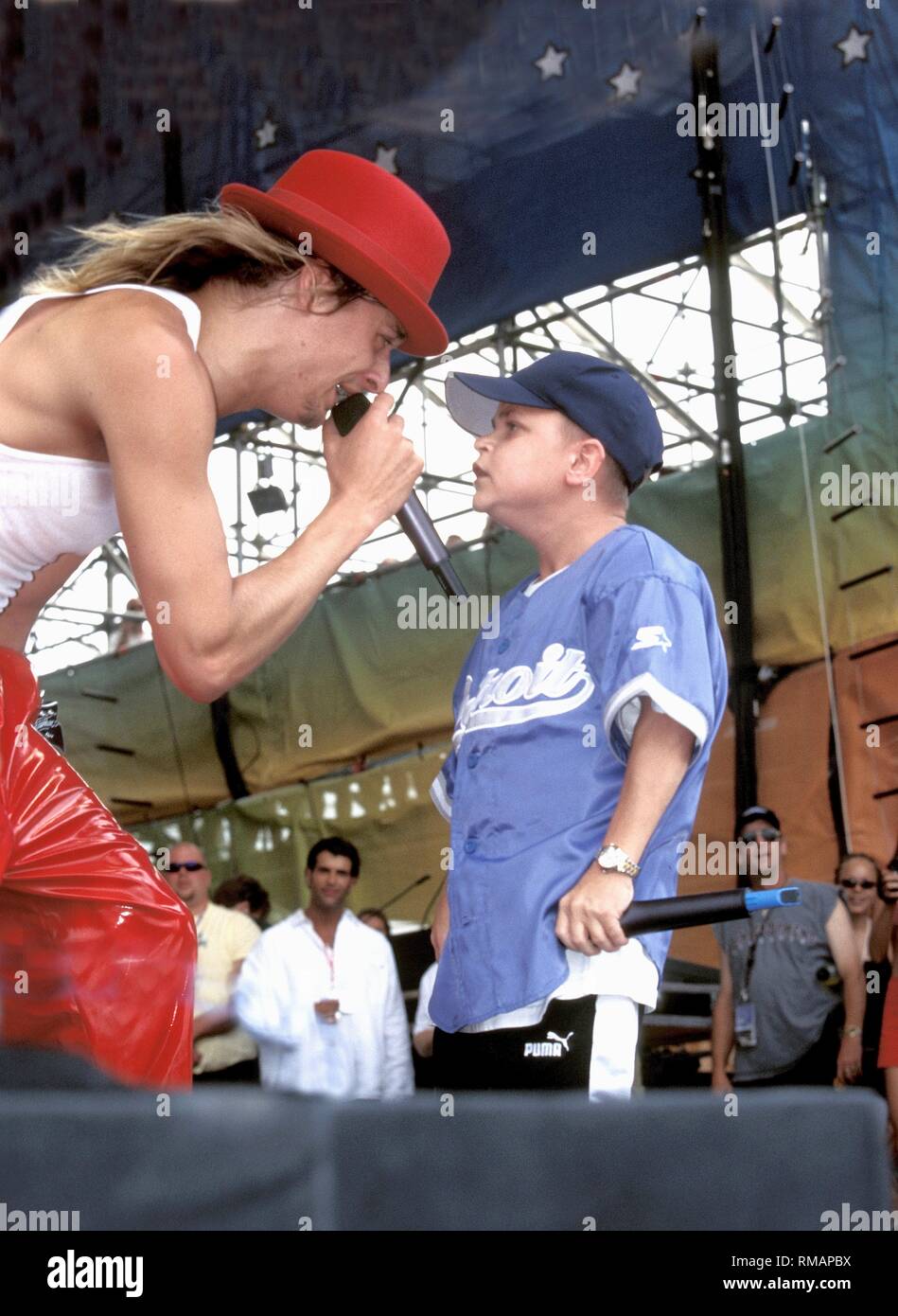 Singer and rapper Joe C. of the Kid Rock band is shown performing on stage at Wookdstock '99 in Rome, New York. Stock Photo