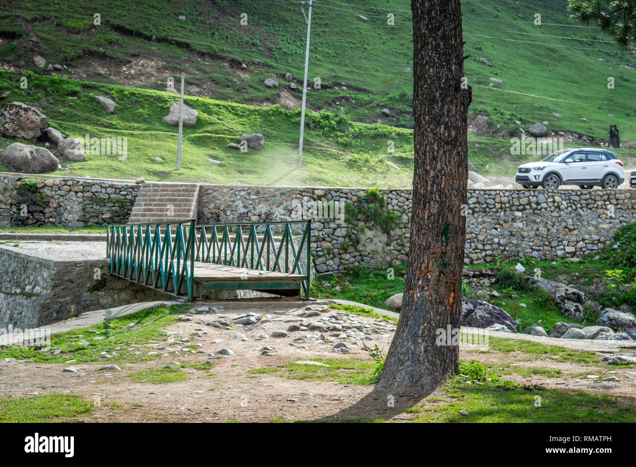 Pahalgam, Jammu & Kashmir, India: Dated- August 20, 2018: A Hyundai Creta SUV car parked on a dusty road in a health resort full of greens Stock Photo