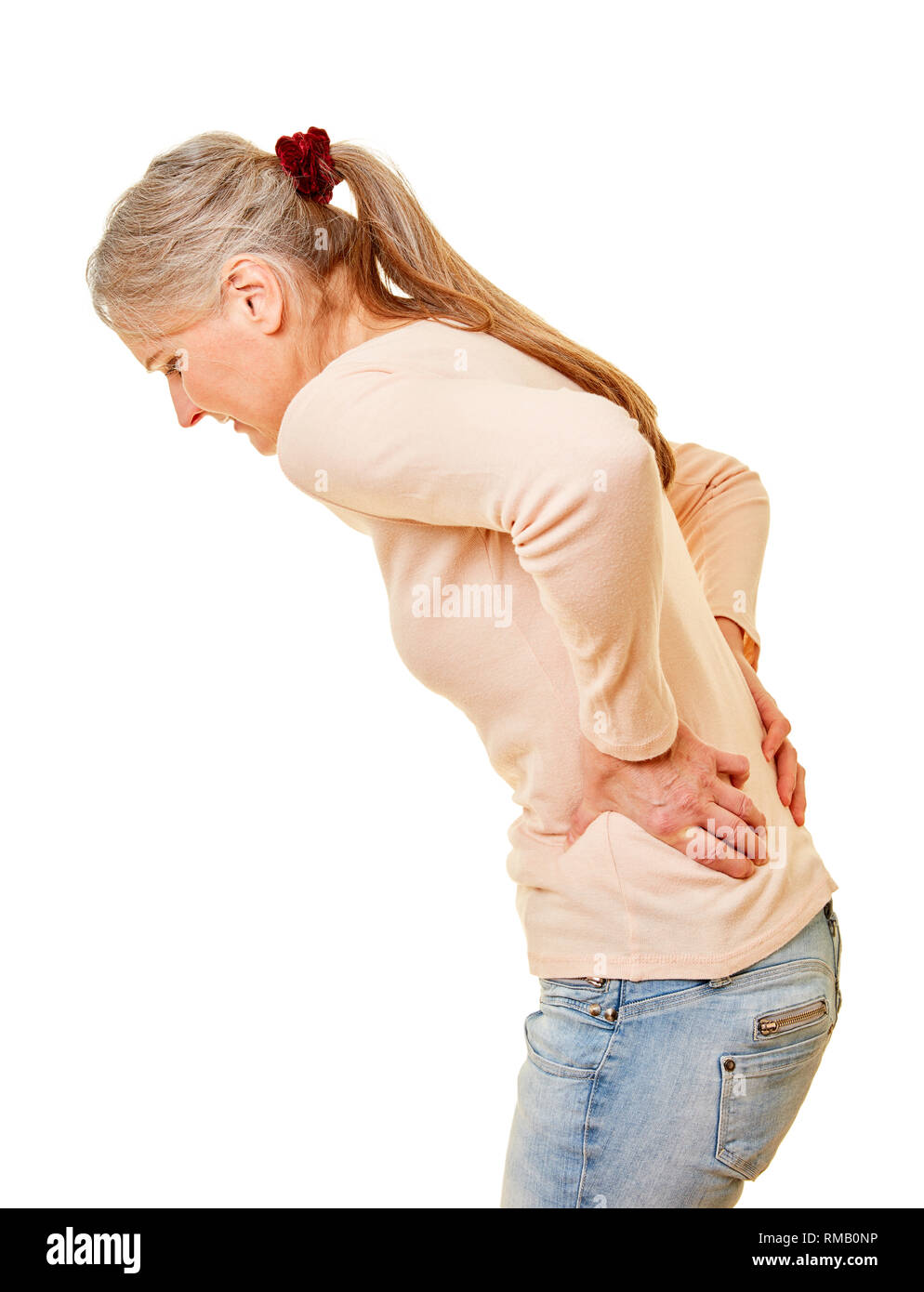 Senior with pain in the back and in the intervertebral discs Stock Photo