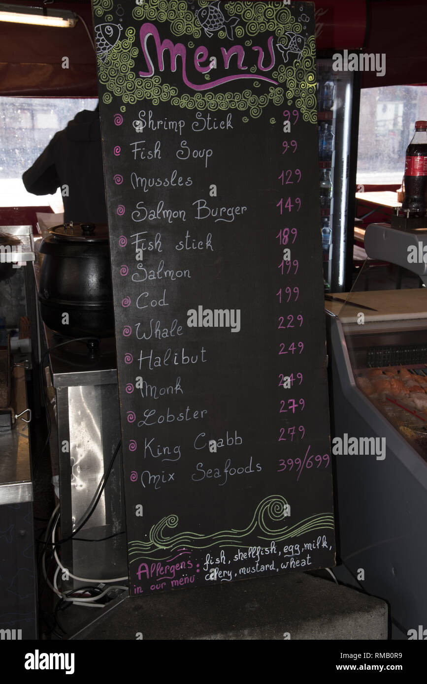 The fish market in the Noewegian city of Bergen is a well known touristic  attraction - and sells whale meat at comparable prices Stock Photo - Alamy