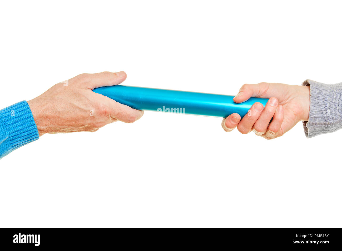 Two hands at baton handing over as a partnership concept Stock Photo