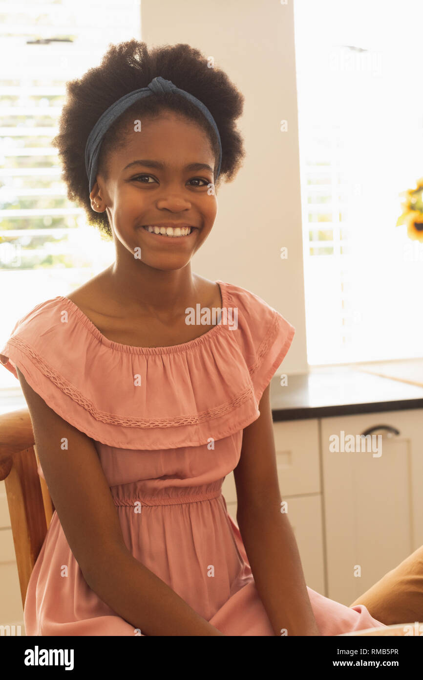 Happy African American girl looking at camera Stock Photo - Alamy