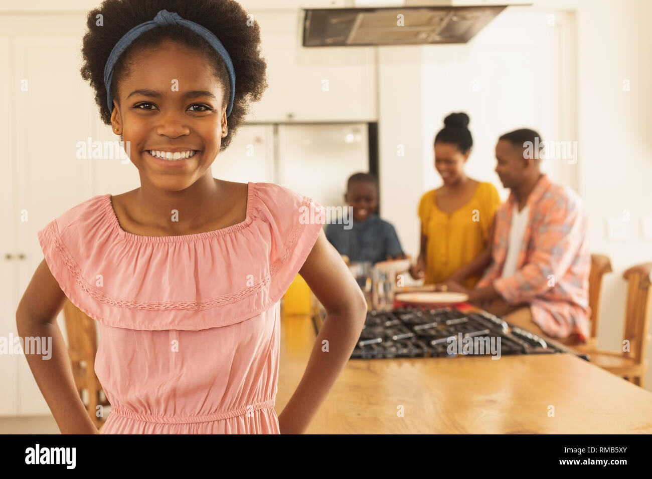 Happy African American girl looking at camera Stock Photo - Alamy